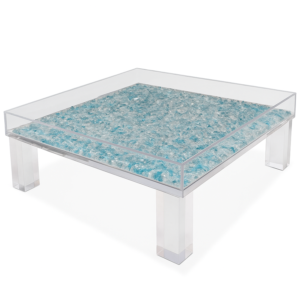 Stylish MAGIC BOX LUCITE TABLE, a versatile coffee table with an openable top, perfect for showcasing colorful stones, flowers, and magazines.